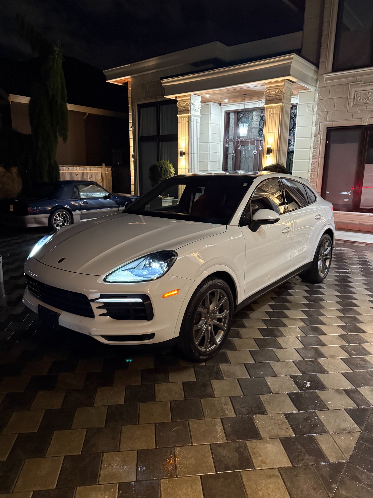 White Porsche Cayenne Coupe mobile detailing Metro Vancouver — front exterior view