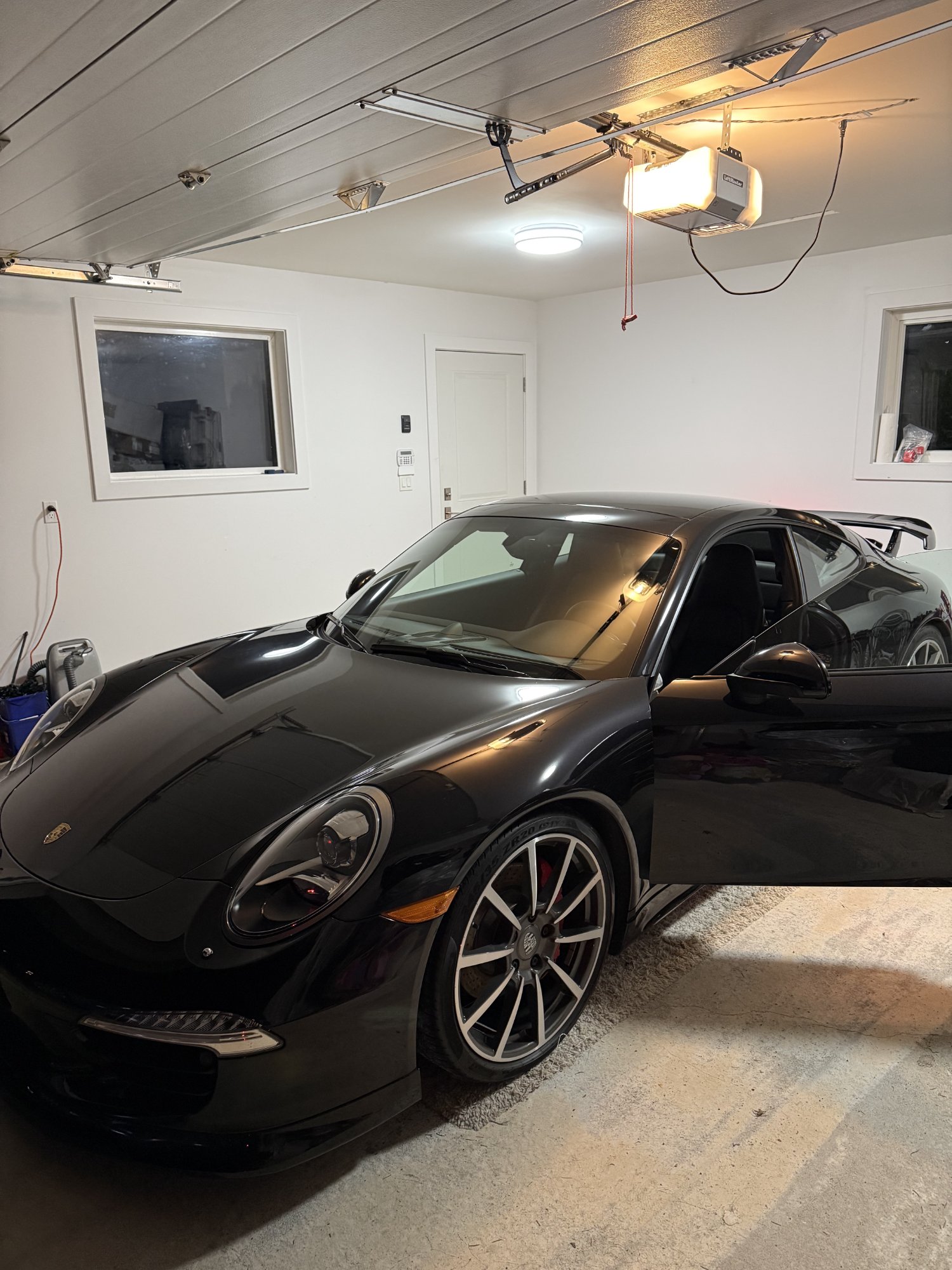 Porsche 911 Carrera S exterior detail Burnaby — black paint correction and ceramic coating