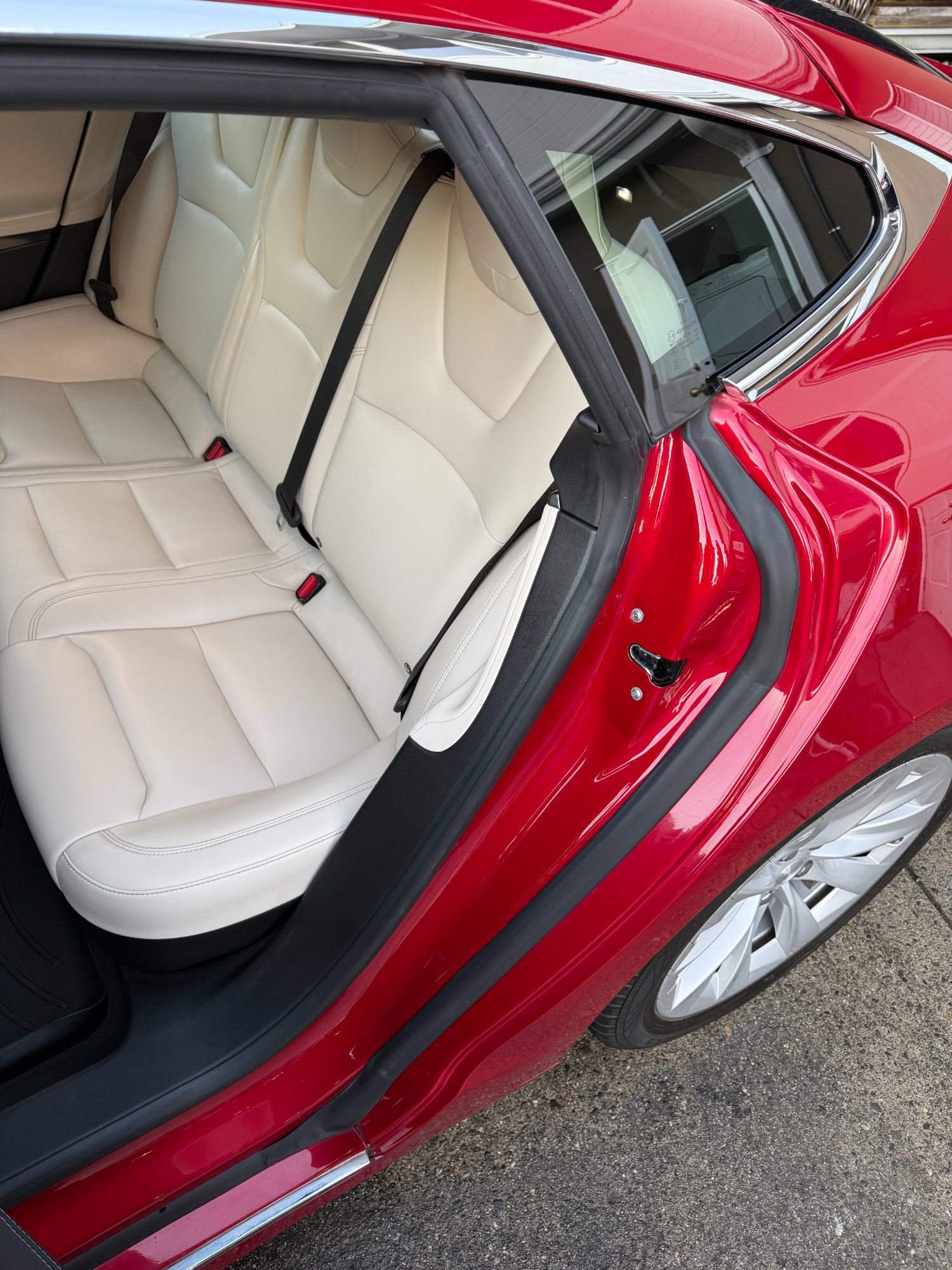 Red Tesla Model S rear seat interior detail — white leather deep clean Vancouver