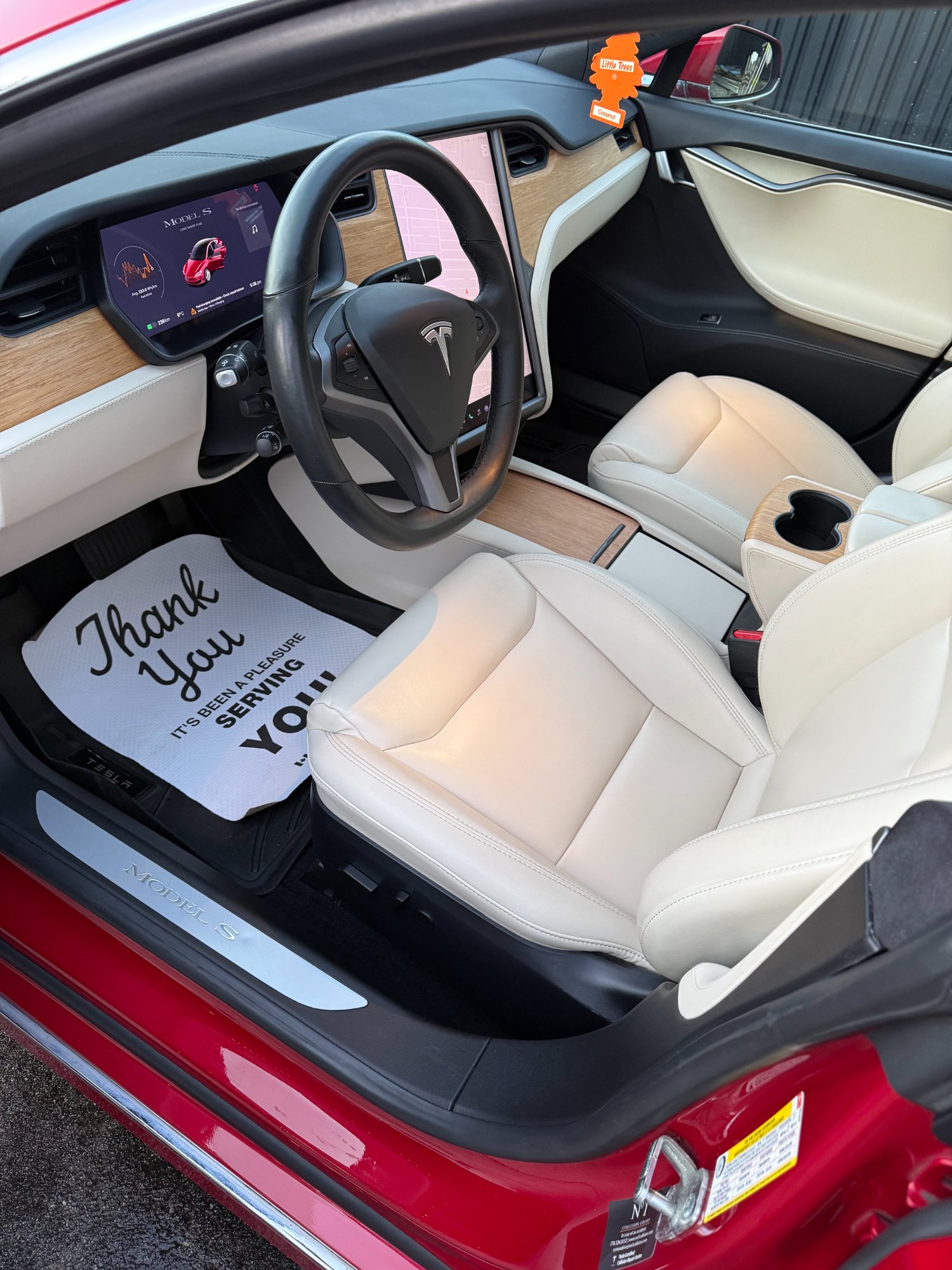 Tesla Model S interior detailing Burnaby — white leather seats and steering wheel detail