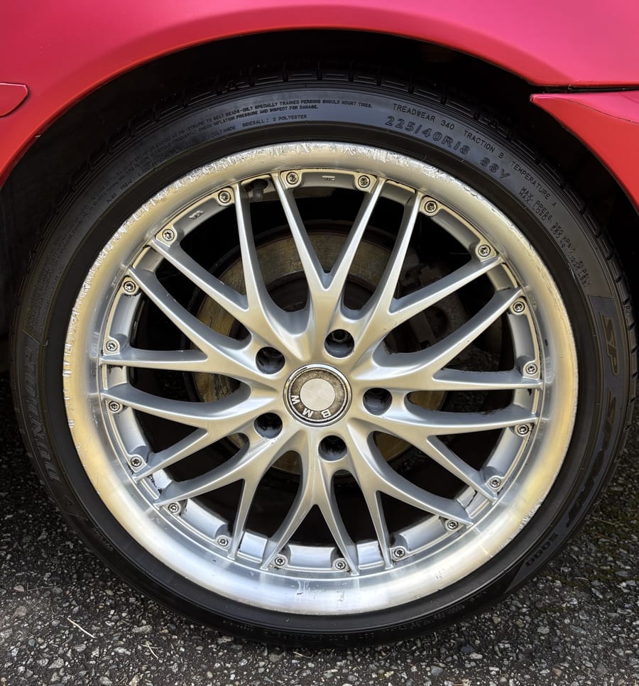 After — BMW wheel restored to gleaming silver